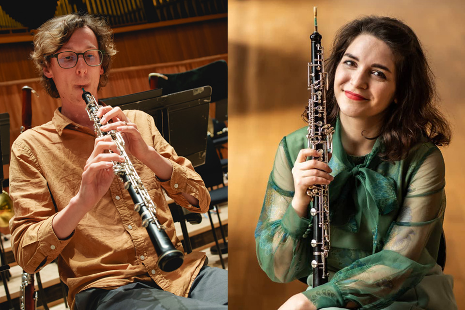 A man in a yellow shirt playing an oboe, and a woman in a green dress holding an oboe